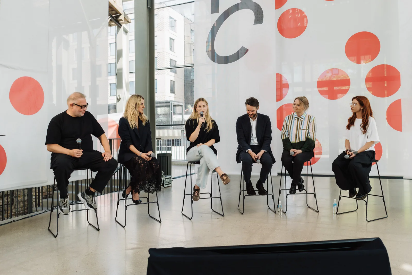 An Artopia founder participating in a panel discussion at Riga Contemporary.