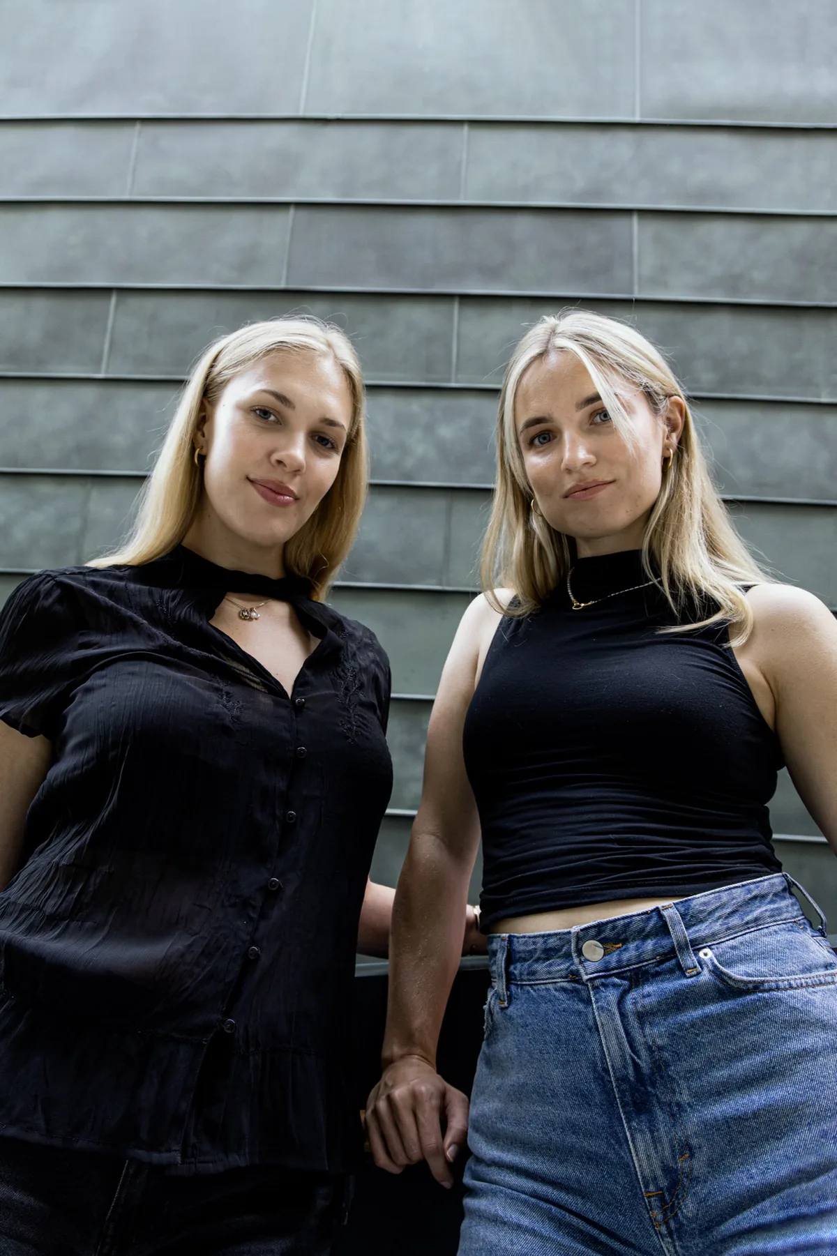 Artopia founders Iida Kaisa Urm and Elisabeth Lootus standing together outdoors.
